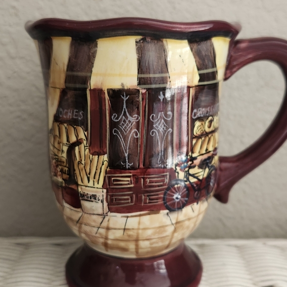 Certified International Kate McRostie Village Scene Mugs....